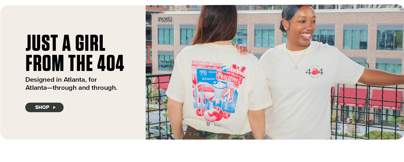 Two women wearing cream-colored "Just a Girl from the 404" Atlanta-themed t-shirts stand on a city rooftop, smiling and enjoying the view. One shirt features bold, colorful Atlanta graphics on the back, while the other shows a front chest logo. The image promotes locally inspired apparel with the tagline “Designed in Atlanta, for Atlanta—through and through,” and includes a “Shop” button.