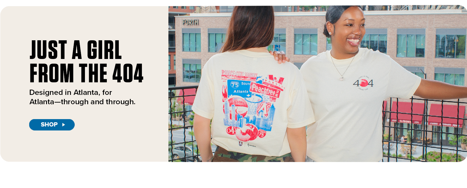 Two women wearing cream-colored "Just a Girl from the 404" Atlanta-themed t-shirts stand on a city rooftop, smiling and enjoying the view. One shirt features bold, colorful Atlanta graphics on the back, while the other shows a front chest logo. The image promotes locally inspired apparel with the tagline “Designed in Atlanta, for Atlanta—through and through,” and includes a “Shop” button.